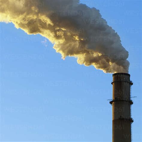 what are flames coming out of a factory smoke stack